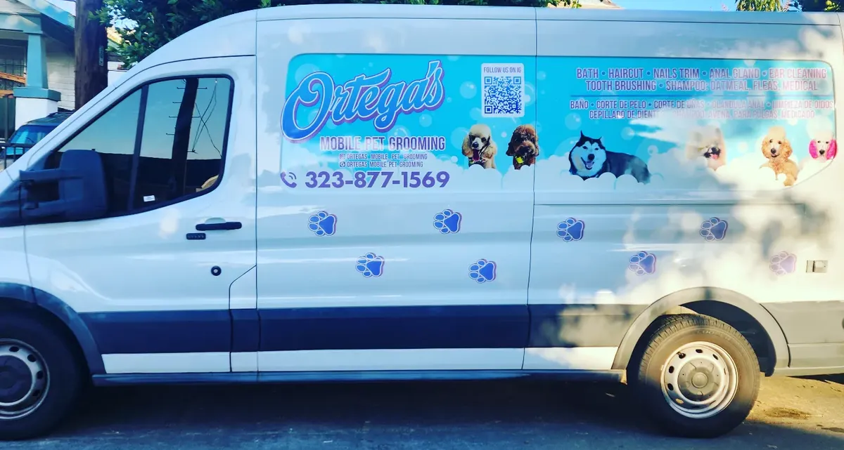 Ortega's Mobile Pet Grooming van parked on a Los Angeles street